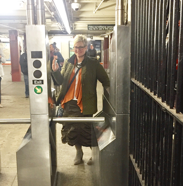 Photo Caption: Jodi Phares on her way to Israel, making the best of her layover on the NYC Subway